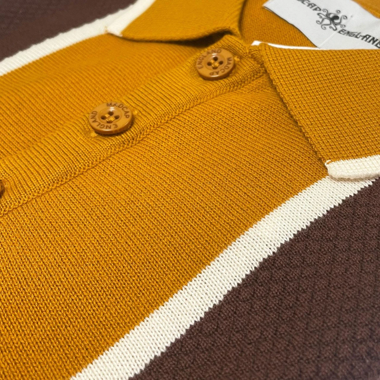 Junot Mod Waffle Stripe Panel Knit Polo Buckthorne 6 Junot Mod Waffle Stripe Panel Knit Polo Buckthorne - Image 4